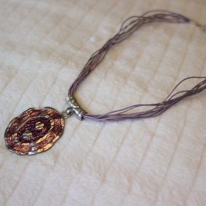 Purple String Necklace with Brass Colored Charm